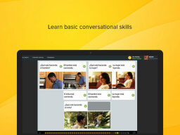Language learning lessons on screen with text saying learn basic conversational skills
