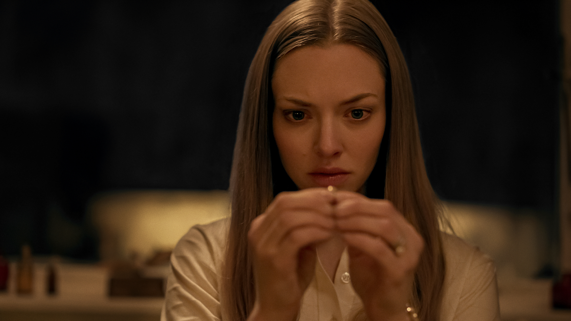 Amanda Seyfried has a pretty grim time of it in "Things Heard and Seen".