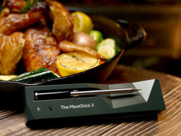 The MeatStick X: Wireless Meat Thermometer on a table.