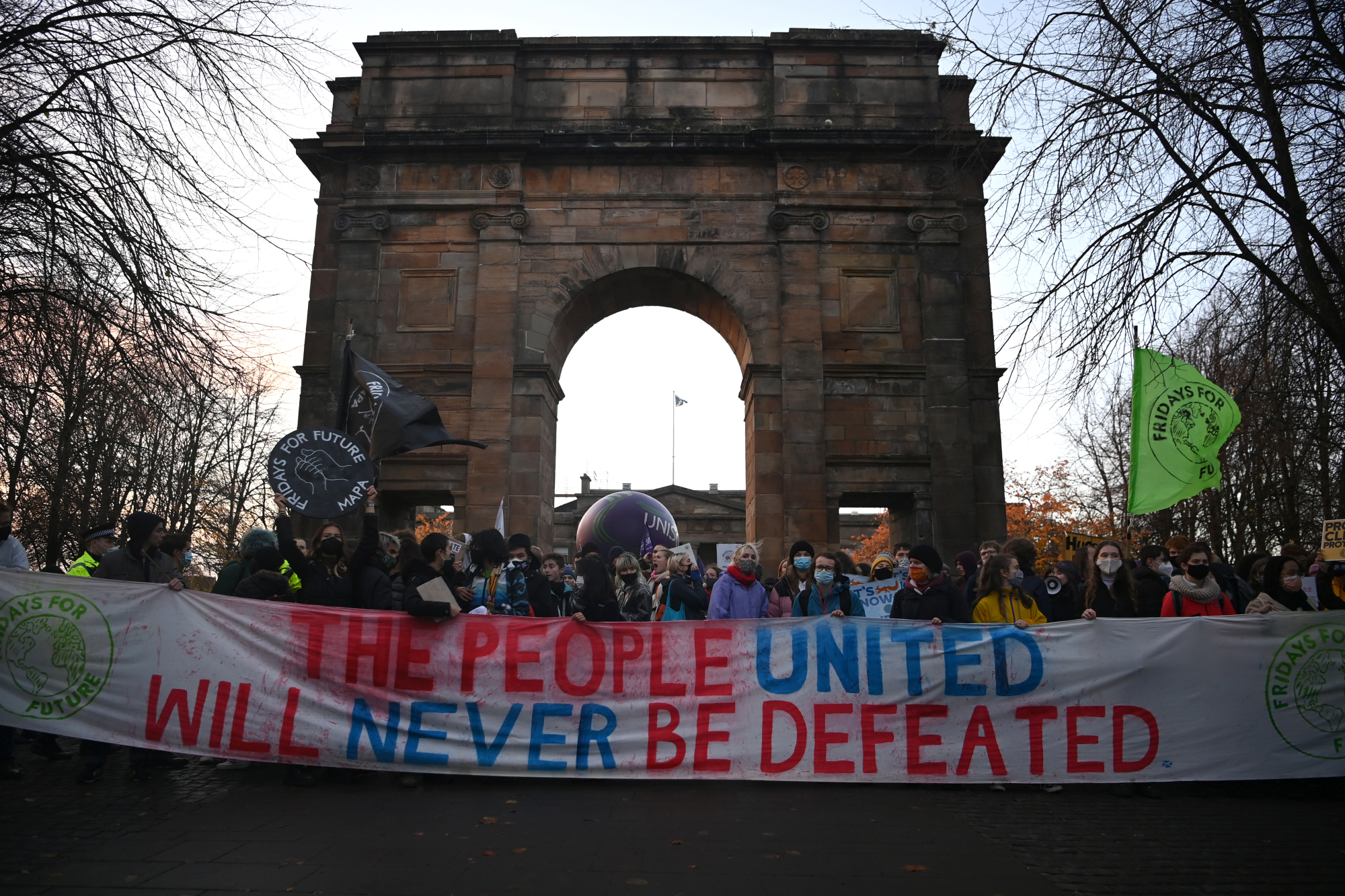 Massive banners were held by protesters in Glasgow.