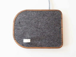 Grey felt on wooden block.