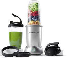 nutribullet pro+ with fruits and a green smoothie