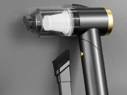 Quantum Handheld Portable Vacuum on a grey background.