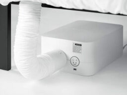 BedJet 3 Climate Comfort Sleep System underneath a bed.
