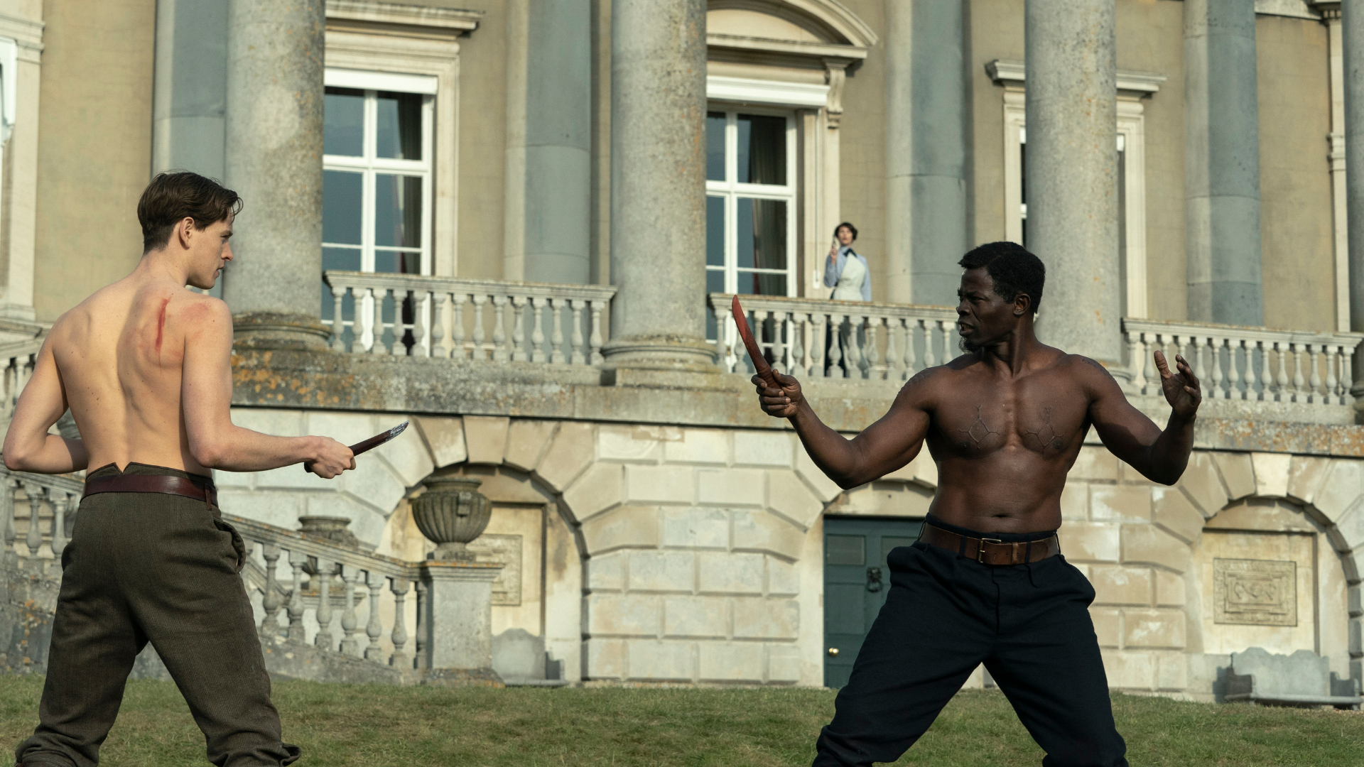 Harris Dickinson, Djimon Hounsou, and Gemma Arterton in "The King's Man."