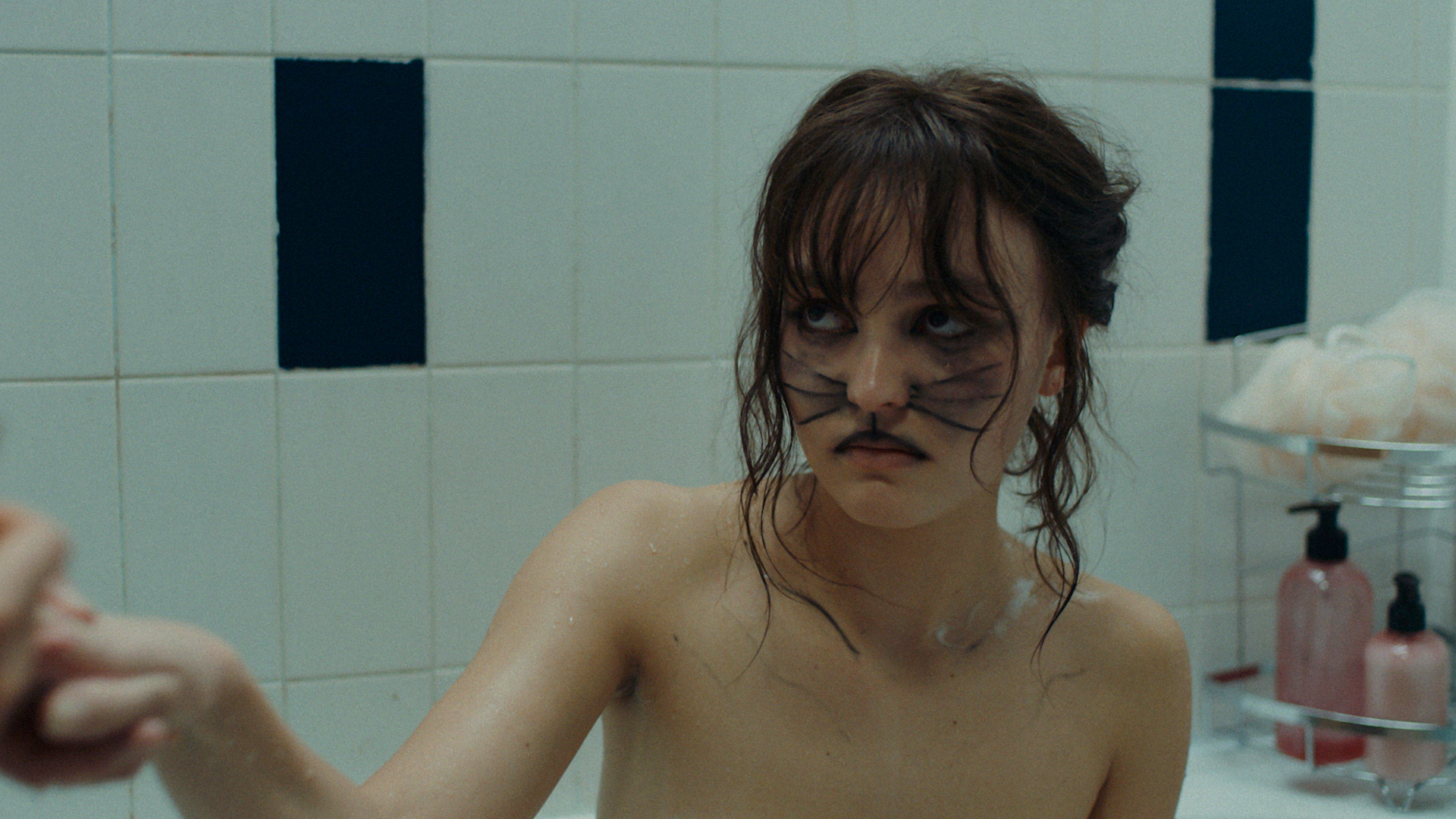 Lily-Rose Deep in another scene as Wildcat for 'Wolf'.