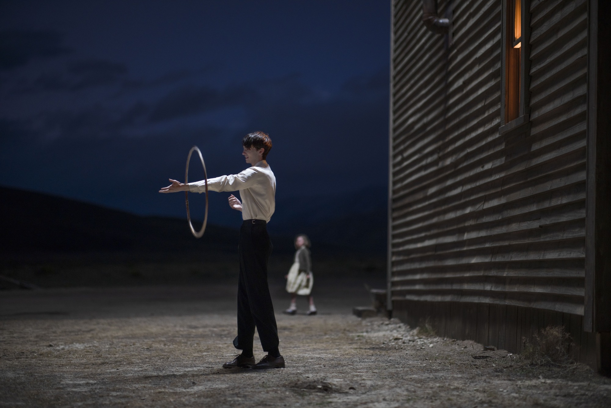 Kodi Smit-McPhee plays with a hula hoop in 'The Power of the Dog.'