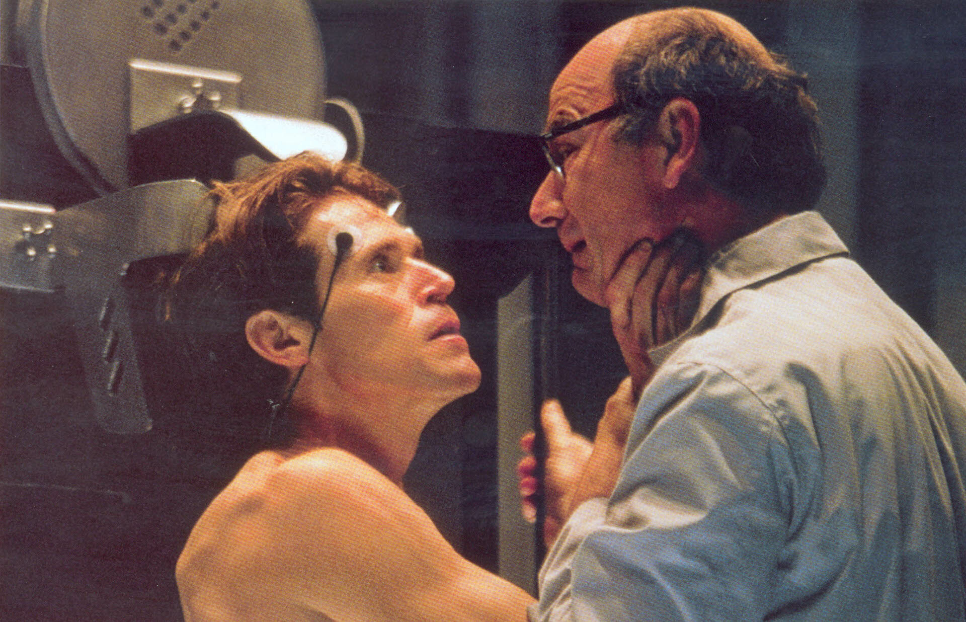 Norman Osborn/Green Goblin choking a scientist in "Spider-Man."