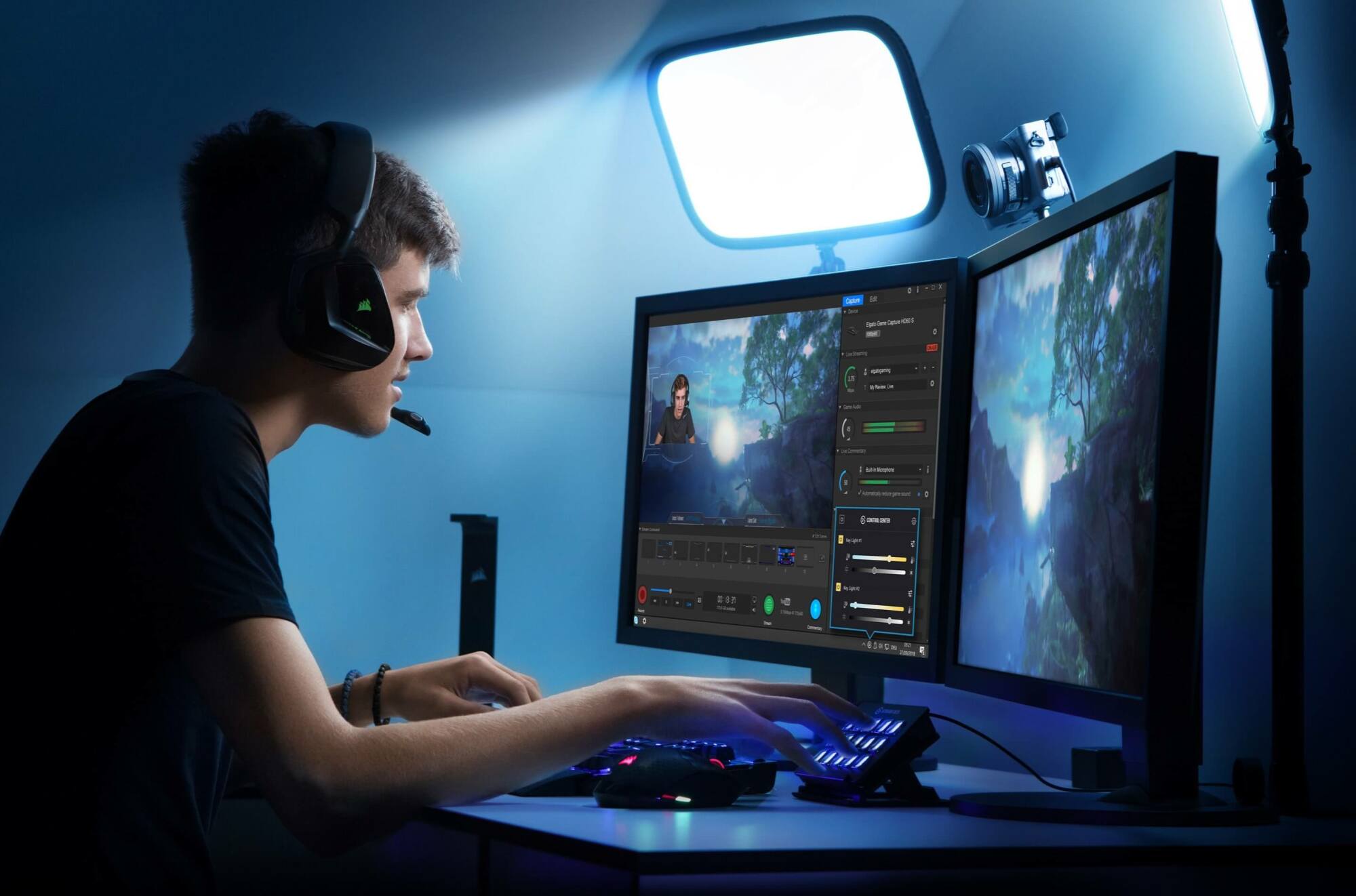 A PC user at his desk, illuminated by an Elgato Key Light.