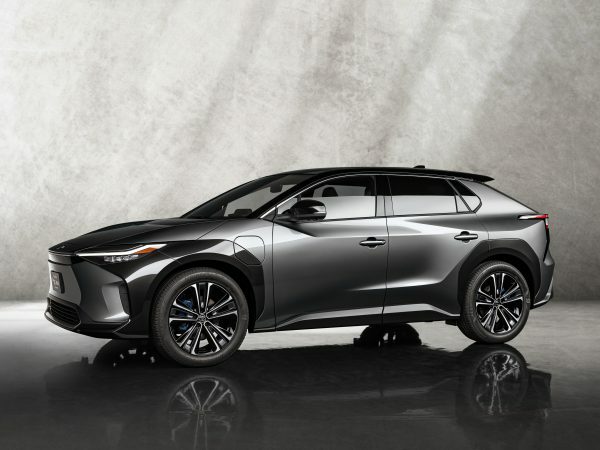 A silver car faces toward the left