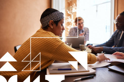 coworking space with graphic white designs and triangles over it