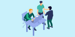People talking around desk