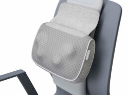 NAIPO oPillow Back Massager on a chair on a white background.