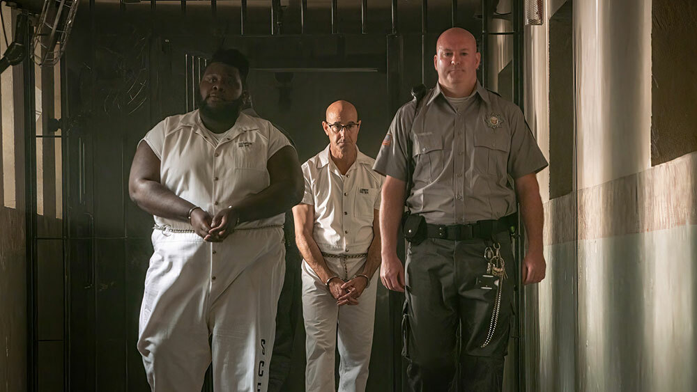 Atkins Estimond and Stanley Tucci in "Inside Man".