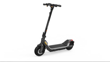 A scooter with some yellow highlights stands upright.