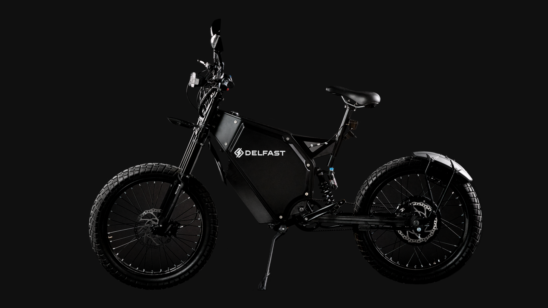 A black e-bike on a black background.