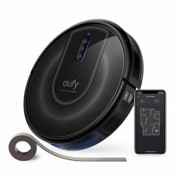 Black Eufy robot vacuum with phone on mapping screen and boundary strips