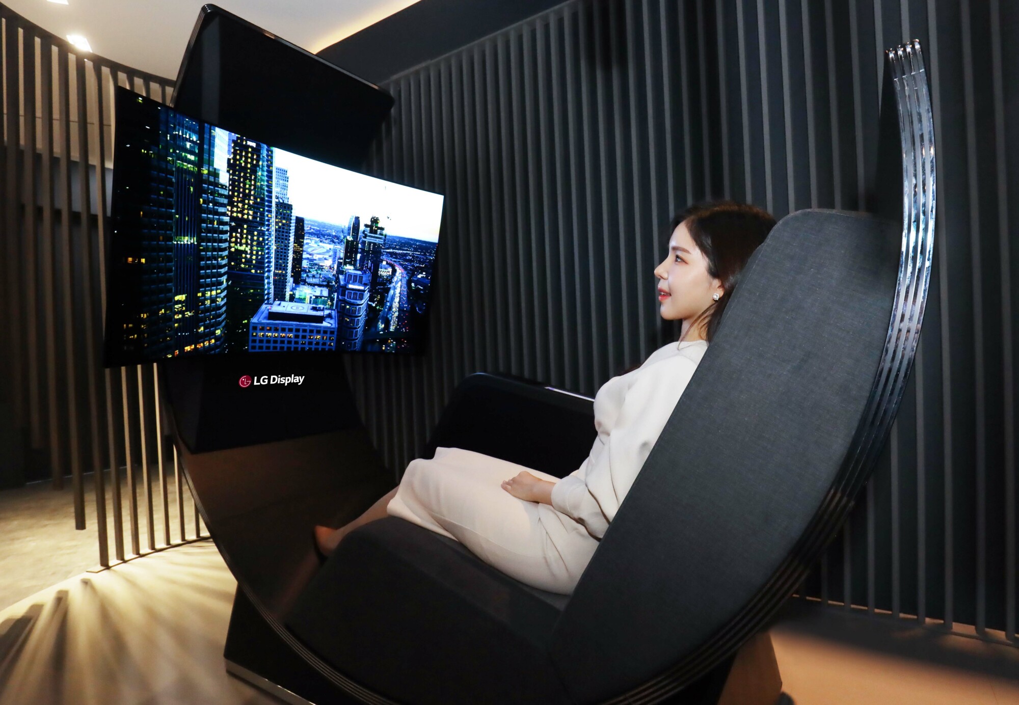 LG Display Media Chair with woman in seat