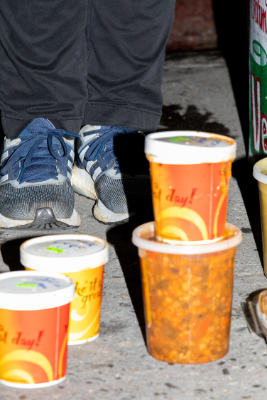 stack of soup on the ground out of focus