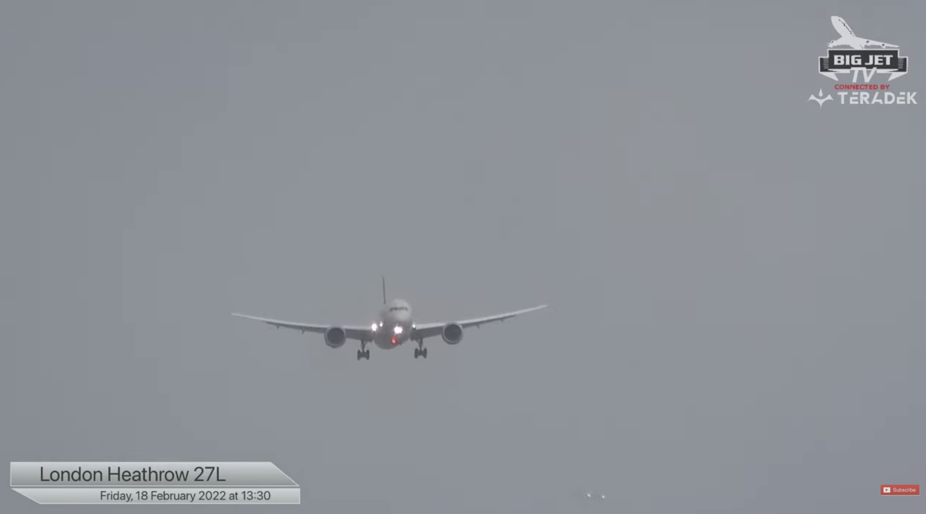 Footage of a plane in the air, coming close to landing at Heathrow airport.