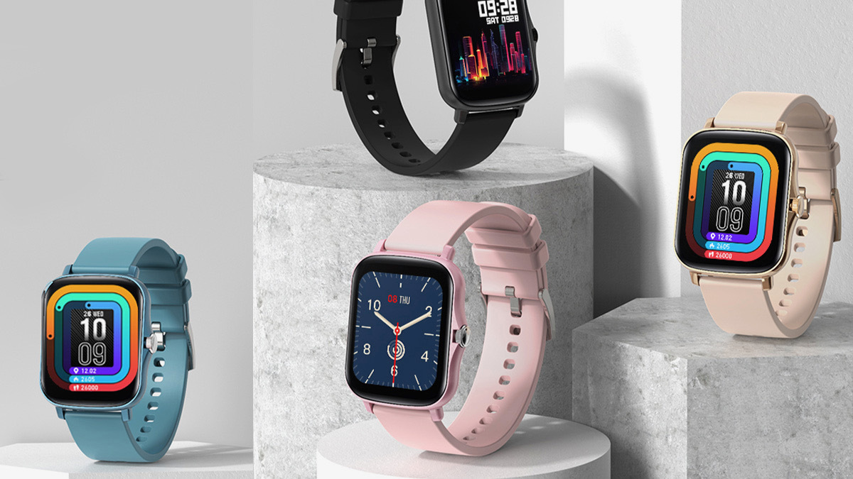 pink, blue, white, and black smartwatches on white stands