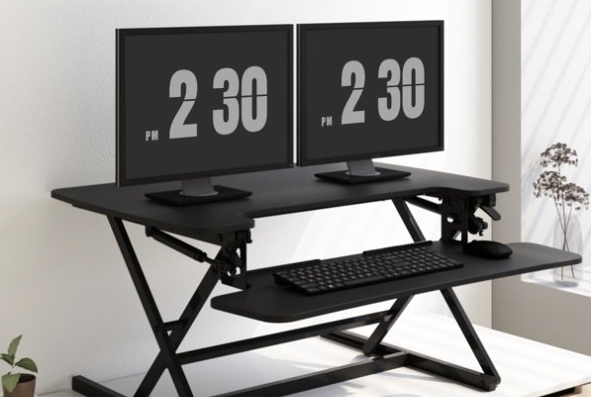 a flexispot standing desk featuring two monitors