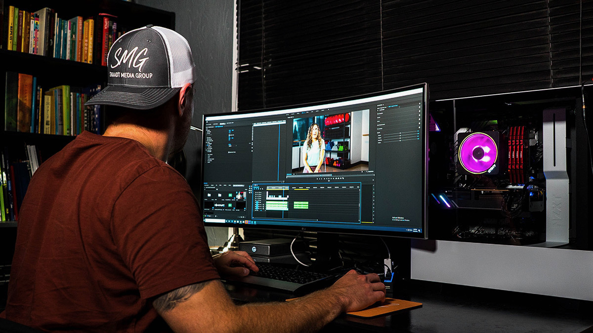 Person at computer using video editing software