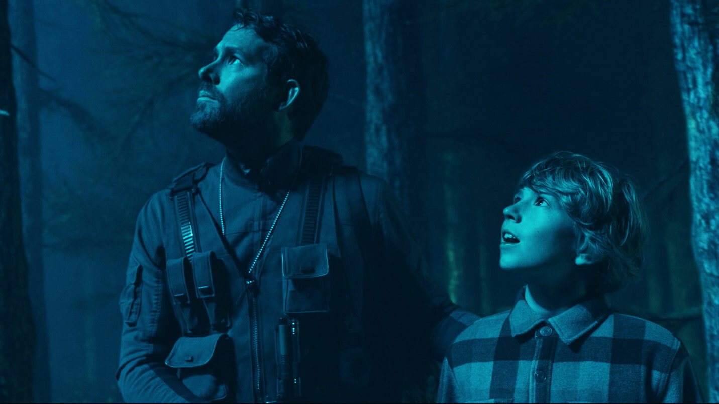 Ryan Reynolds and Walker Scobell in
