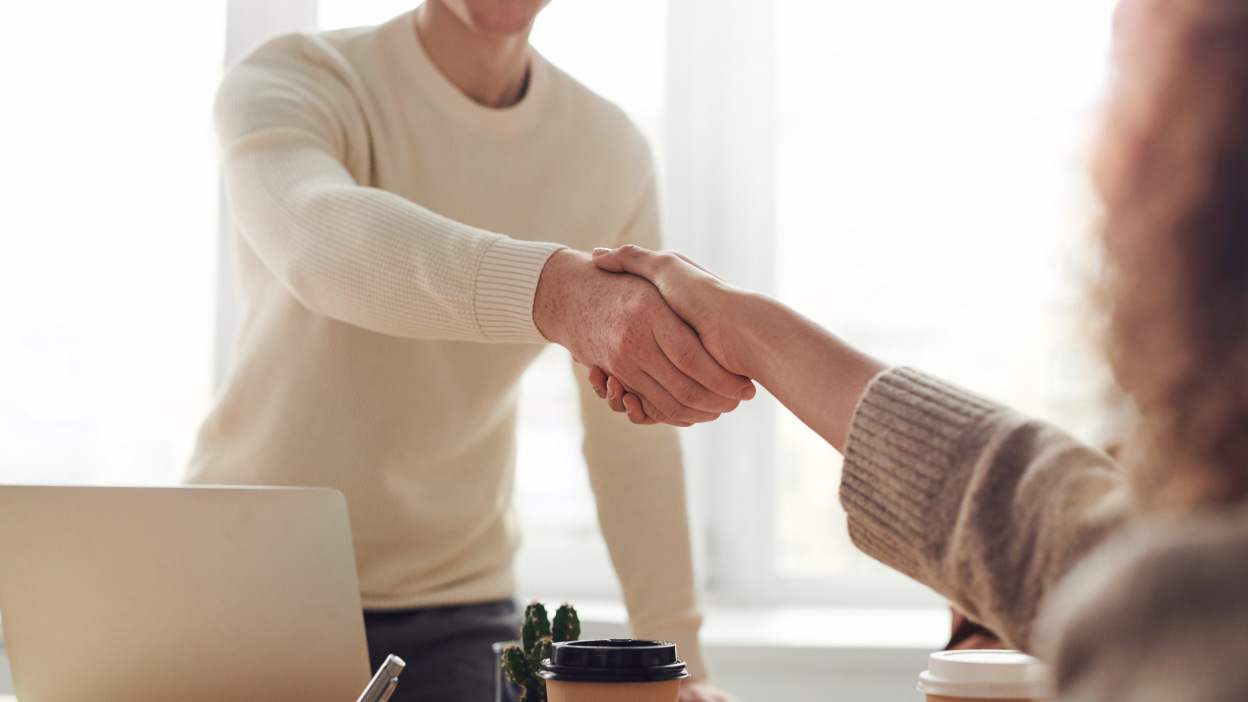 Two people shaking hands