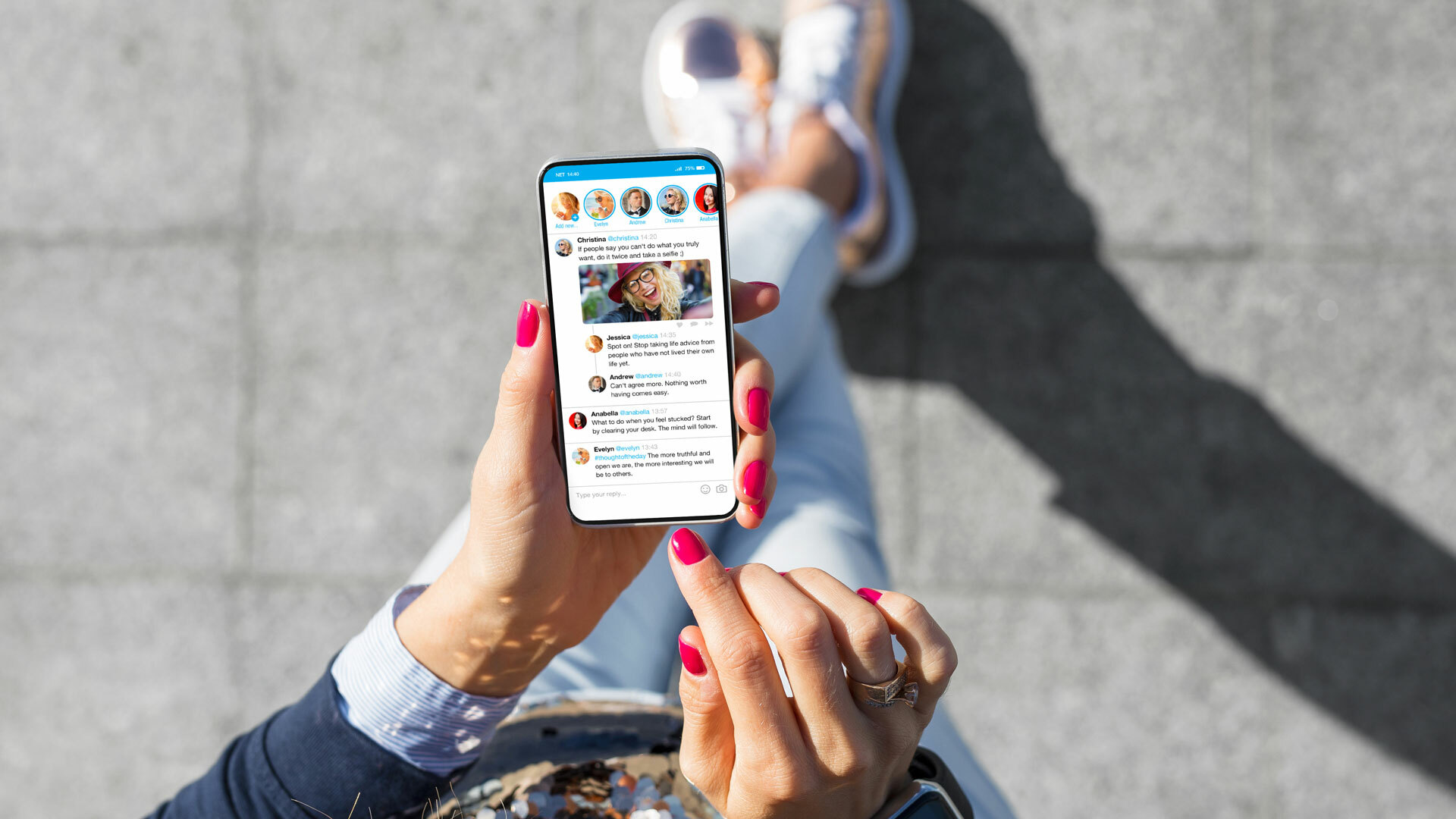 A first-person perspective view of someone looking down at their phone as they're walking.
