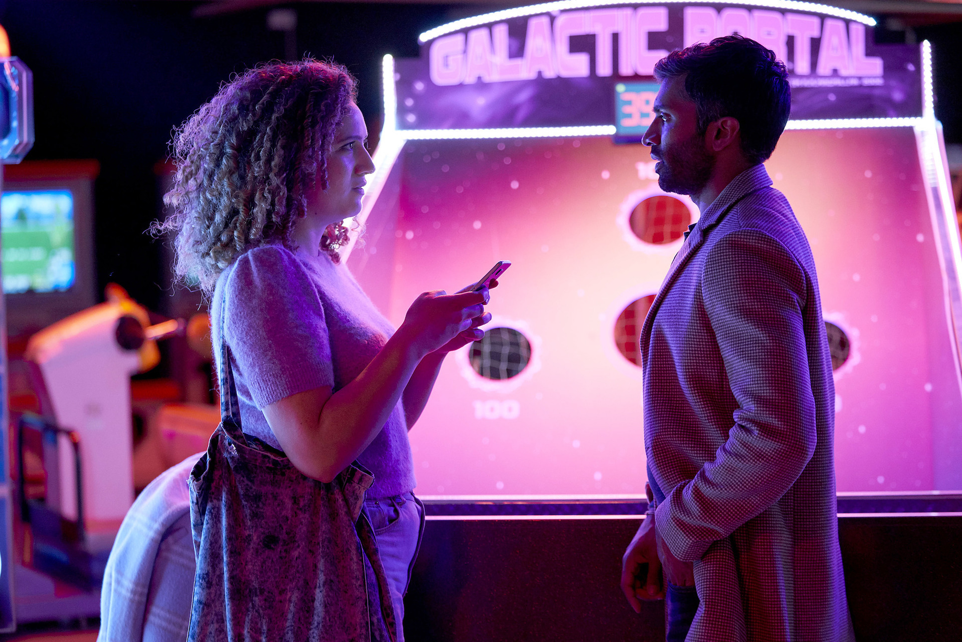Nikesh Patel and Rose Matafeo in an arcade in "Starstruck."