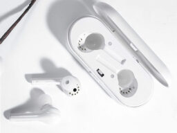 White earbuds in charging case