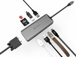 Grey port with leading usb-c cord and other wires surrounding it 