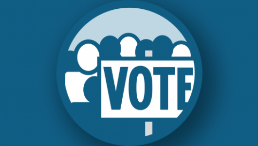 Cartoon image of a Vote sticker or button