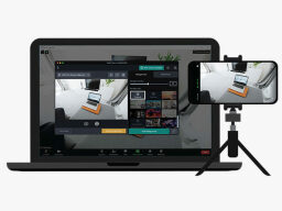Phone on tripod showing video screen and laptop showing same image in a video editing window