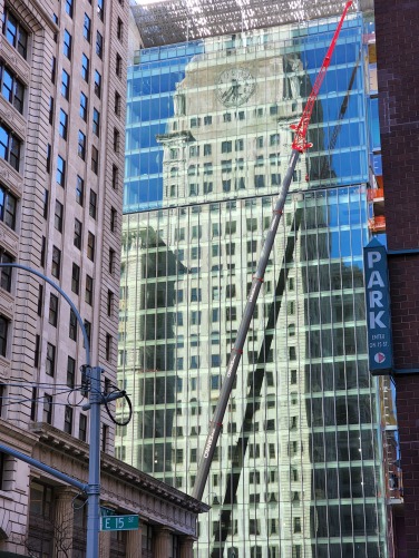 Close-up of building reflection on windows.