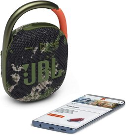 Camo clip-on speaker next to phone