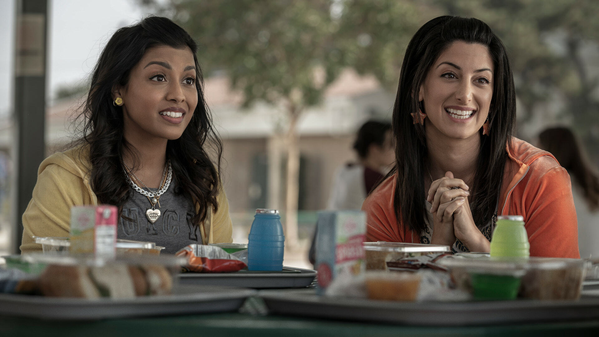 Two adult women dressed as teenagers from 2006 in a still from "The Afterparty."