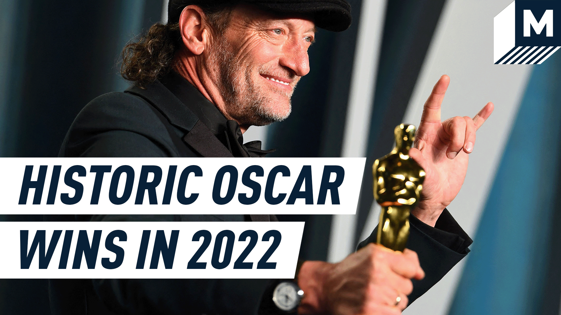 Deaf actor Troy Kotsur holding his Oscar statue at the Oscars 2022