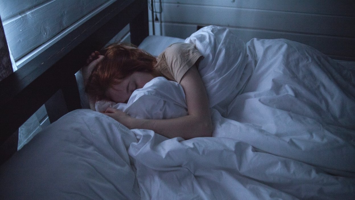 Girl sleeping in bed