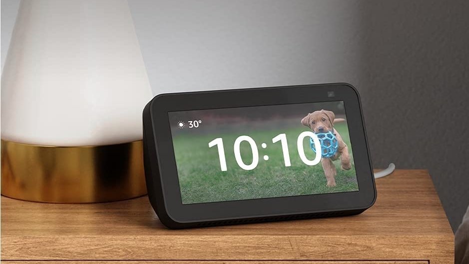 Amazon Alexa showing 10:10 on bedside table 