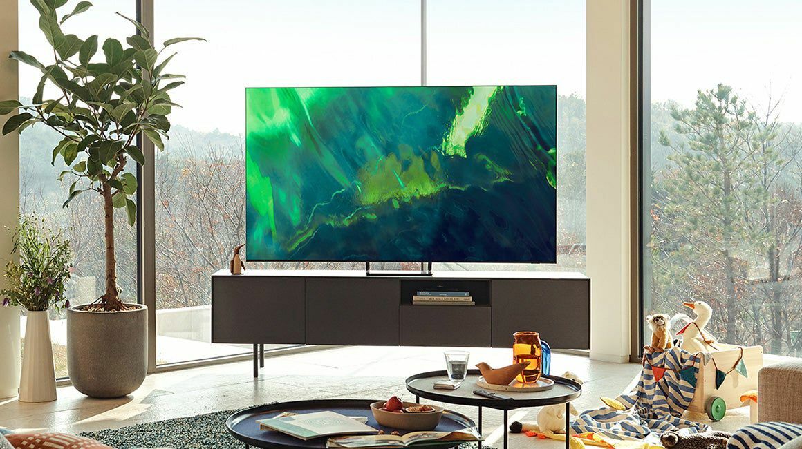 Samsung QLED TV on a TV stand