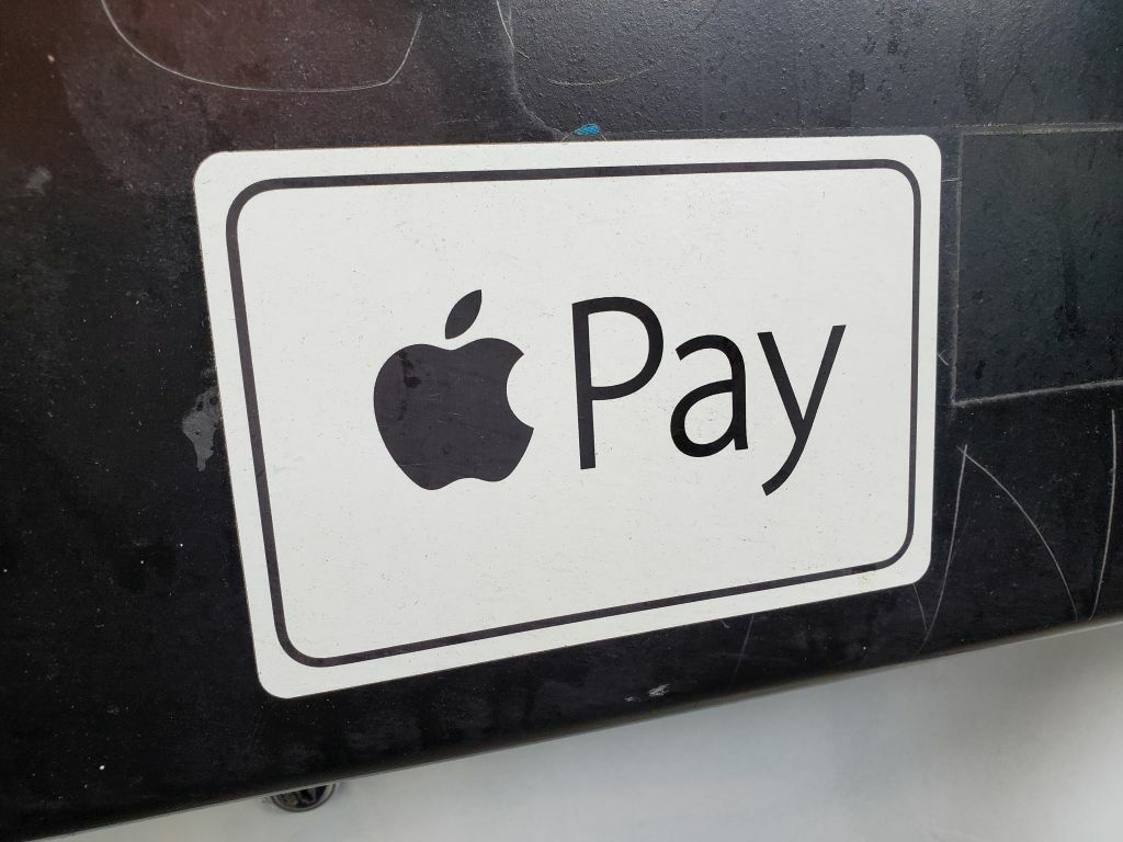 Sticker with Apple Pay logo, which consists of an Apple shape next to the word 