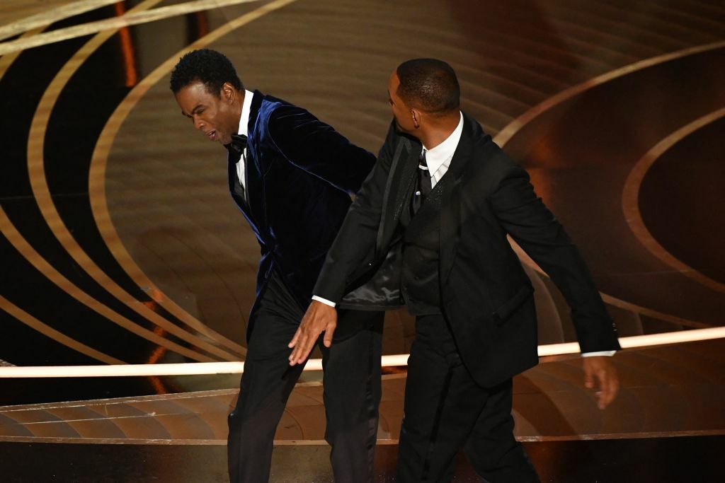 Will Smith slaps Chris Rock onstage during the 94th Oscars at the Dolby Theatre in Hollywood, California on March 27, 2022. 