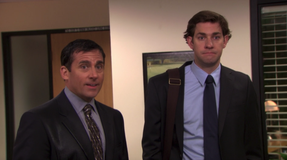 A screenshot of two men, Steve Carell as Michael Scott and John Krasinski as Jim Halpert, from an episode of 