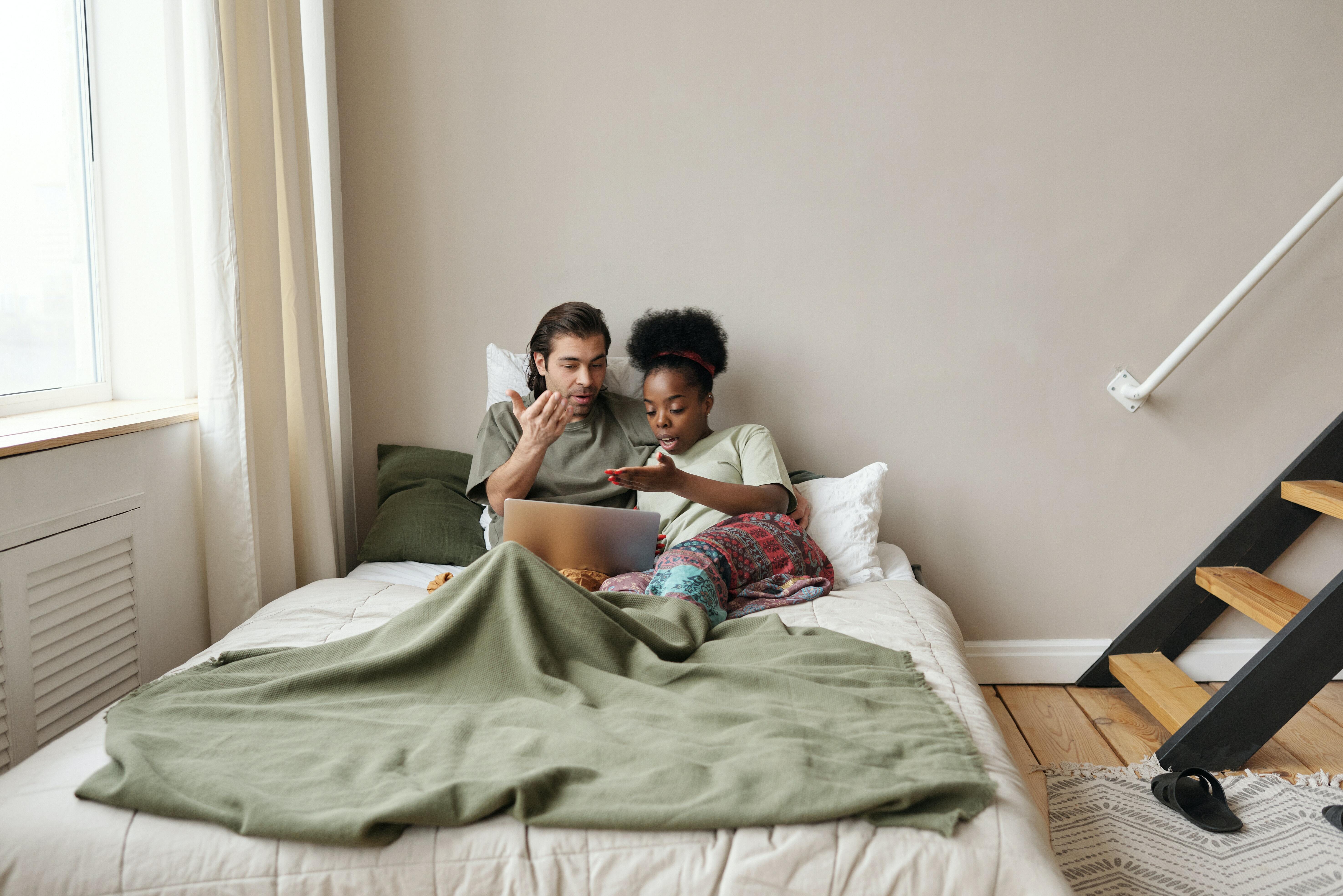 Couple looking at laptop