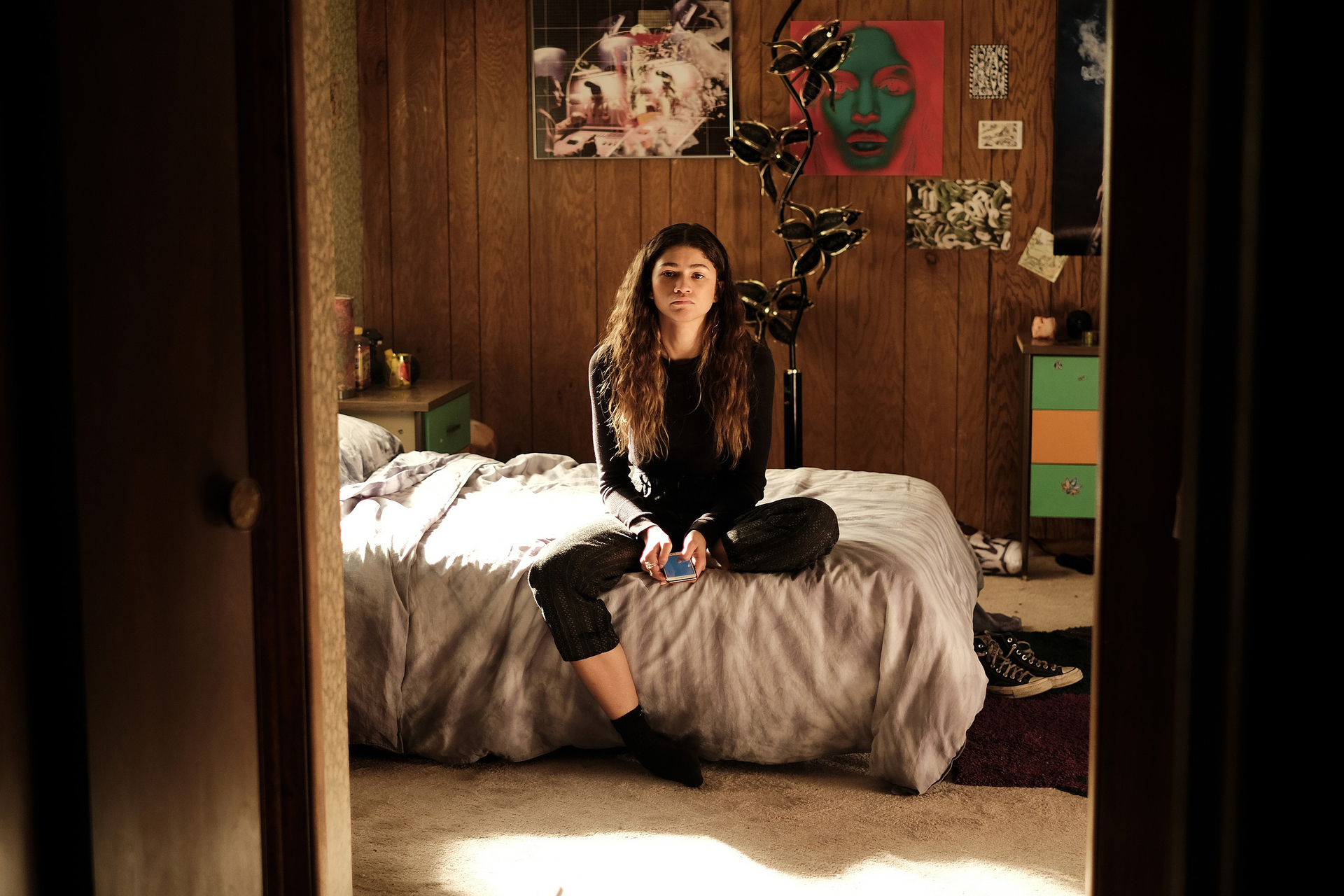 A still from 'Euphoria' where Rue (Zendaya) is sitting on her bed