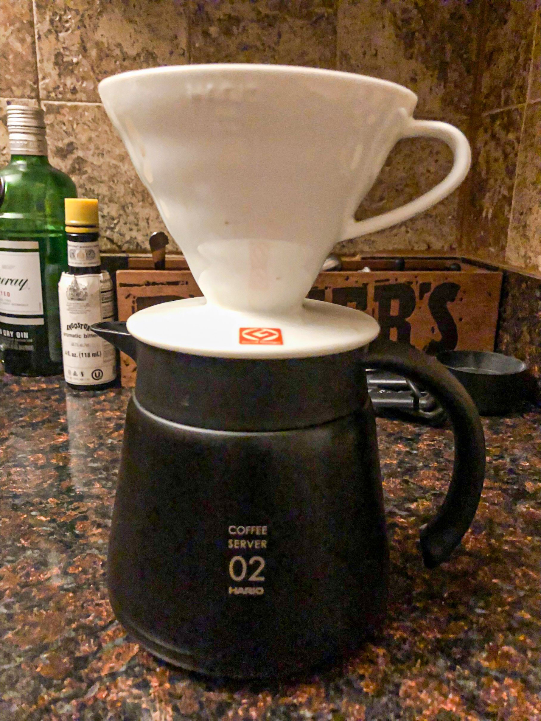 Hario coffee server with coffee dripper on top