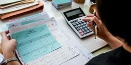 Paper and calculator with numbers