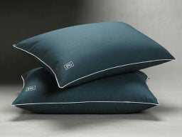 Two green pillows stacked